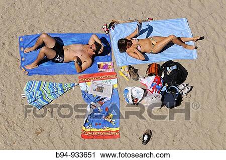 People sunbathing, Saint-Chely-du-Tarn, Lozere, Languedoc-Roussillon, France View Large Photo Image Stock Image - People sunbathing, Saint-Chely-du-Tarn, Lozere, Languedoc-Roussillon, France. Fotosearch