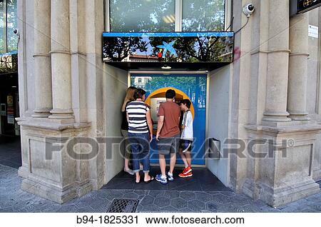 People using an ATM, Barcelona, Catalonia, Spain View Large Photo Image Stock Image - People using an ATM, Barcelona, Catalonia, Spain. Fotosearch