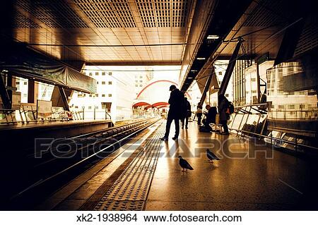 People waiting in Canary Wharf DLR station, London, UK View Large Photo Image Picture - People waiting in Canary Wharf DLR station, London, UK. Fotosearch