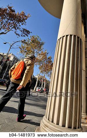 People walking along Passeig de Gracia, Barcelona, Catalonia, Spain. View Large Photo Image Stock Image - People walking along Passeig de Gracia, Barcelona, Catalonia, Spain.. Fotosearch