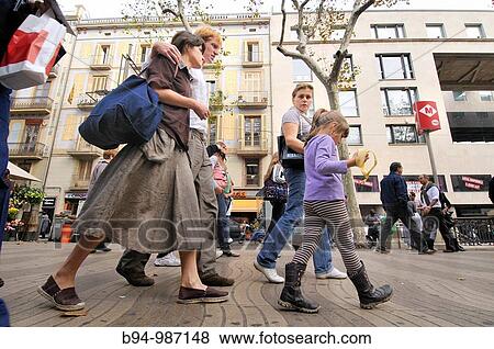 People walking on La Rambla, Barcelona, Catalonia, Spain View Large Photo Image Stock Photo - People walking on La Rambla, Barcelona, Catalonia, Spain. Fotosearch