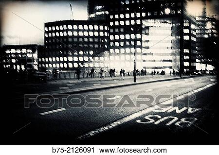 People walking through London Bridge at night. London, England, UK View Large Photo Image Stock Image - People walking through London Bridge at night. London, England, UK. Fotosearch