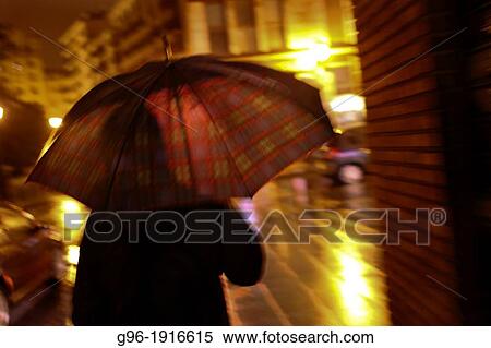 Stock Photography - people with umbrella. Fotosearch
