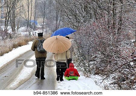 People with umbrellas and snow. Osseja, Languedoc-Roussillon, Pyrenees Orientales, France View Large Photo Image Stock Photograph - People with umbrellas and snow. Osseja, Languedoc-Roussillon, Pyrenees Orientales, France. Fotosearch
