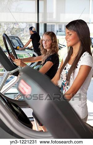 People working out at the gym View Large Photo Image Stock Image - People working out at the gym. Fotosearch