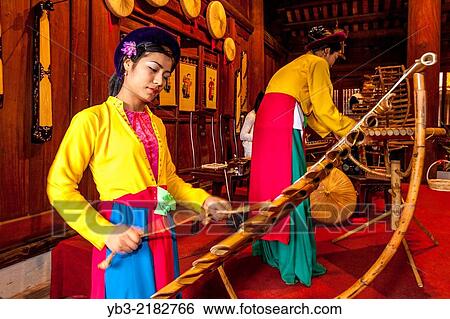 Performing Female Musicians, Temple Of Literature, Hanoi, Vietnam. View Large Photo Image Stock Photograph - Performing Female Musicians, Temple Of Literature, Hanoi, Vietnam.. Fotosearch
