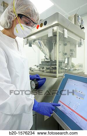 Performing technical checks during a compression process, Tableting, Clean room, Pharmaceutical plant, Drug manufacturing plant, Research Center, Pharmacy, Area Health, Tecnalia Research & Innovation, Araba Technology Park, Miano, Basque Country, Spain View Large Photo Image Picture - Performing technical checks during a compression process, Tableting, Clean room, Pharmaceutical plant, Drug manufacturing plant, Research Center, Pharmacy, Area Health, Tecnalia Research & Innovation, Araba Technology Park, Miano, Basque Country, Spain. Fotosearch