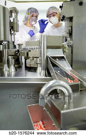 Picture - Performing technical controls during an encapsulation process, Tecnalia Research & Innovation, Araba Technology Park, Miano, Basque Country, Spain. Fotosearch