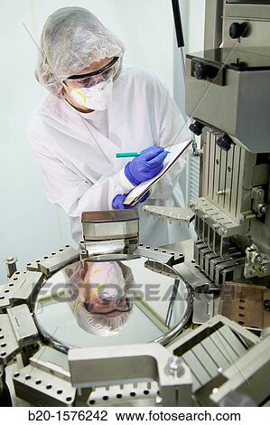Stock Image - Performing technical controls during an encapsulation process, Tecnalia Research & Innovation, Araba Technology Park, Miano, Basque Country, Spain. Fotosearch