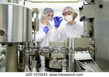 Stock Image - Performing technical controls during an encapsulation process, Tecnalia Research & Innovation, Araba Technology Park, Miano, Basque Country, Spain. Fotosearch
