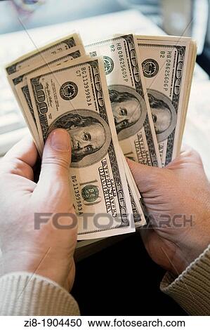 Person counting money View Large Photo Image Stock Image - Person counting money. Fotosearch