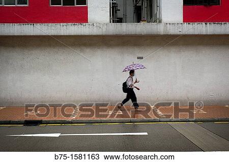 Person, Man, with umbrella, Hong Kong, China, Asia View Large Photo Image Stock Image - Person, Man, with umbrella, Hong Kong, China, Asia. Fotosearch