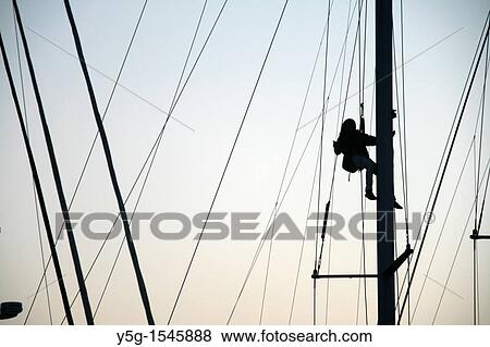 person repairing yacht boat rigging View Large Photo Image Stock Photo - person repairing yacht boat rigging. Fotosearch