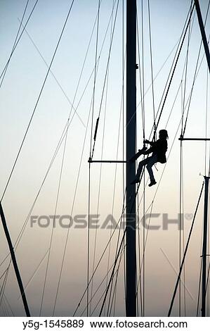 person repairing yacht boat rigging View Large Photo Image Stock Photo - person repairing yacht boat rigging. Fotosearch