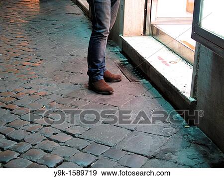 Person standing by shop window in Rome, Italy View Large Photo Image Stock Photo - Person standing by shop window in Rome, Italy. Fotosearch