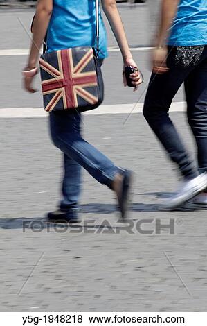 person with union jack bag in street road in city town. View Large Photo Image Stock Photo - person with union jack bag in street road in city town.. Fotosearch
