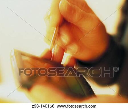 Stock Photograph - Personal Digital Assistant. Fotosearch