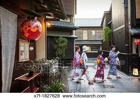 persons wearing kimono Geisha's distric of Gion Kyoto Kansai, Japan View Large Photo Image Stock Photo - persons wearing kimono Geisha's distric of Gion Kyoto Kansai, Japan. Fotosearch