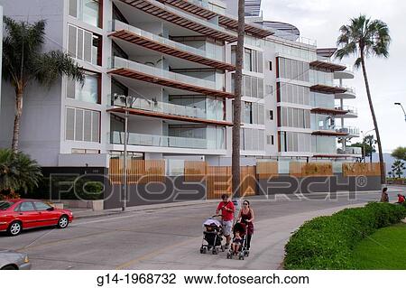 Peru, Lima, Barranco District, Malecon Souza, oceanfront, street scene, Edificio Mistral, building, condominium, flats, housing, modern architecture, balcony, Hispanic, man, woman, baby, stroller, family, parent, child, walking, landscaping,. View Large Photo Image Stock Image - Peru, Lima, Barranco District, Malecon Souza, oceanfront, street scene, Edificio Mistral, building, condominium, flats, housing, modern architecture, balcony, Hispanic, man, woman, baby, stroller, family, parent, child, walking, landscaping,.. Fotosearch