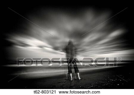 Pesadilla. Figura humana entre nubes. View Large Photo Image Stock Image - Pesadilla. Figura humana entre nubes.. Fotosearch