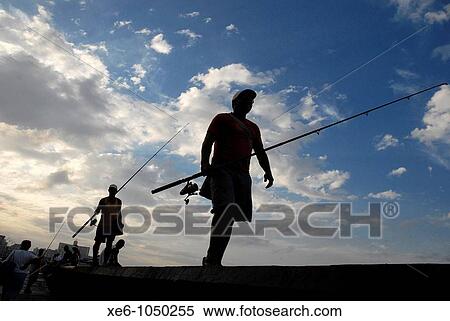 Pescadores en el Malec? n de La Habana, Cuba View Large Photo Image Stock Photography - Pescadores en el Malec? n de La Habana, Cuba. Fotosearch