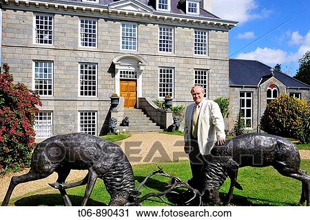 Stock Image - Peter de Sausmarez belongs to an old family who is on the island sonce 1120 and is the last seignior who lives in its ancestral manor Guernsey, Channel Islands, UK. Fotosearch