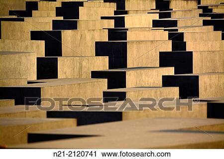 Stock Image - Peter Eisenman's Memorial to the Murdered Jews of Europe, also known as The Holocaust Memorial. Friedrichstadt neighborhood. Berlin, Germany, Europe.. Fotosearch