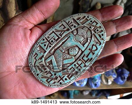 Stock Image - Pharaonic relief, Islamic Quarter, Cairo, Egypt. Fotosearch