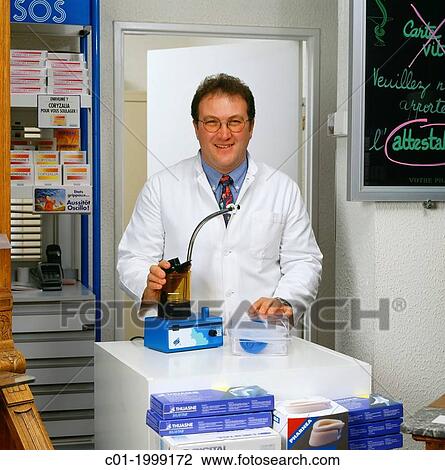 Pharmacist presenting personal hygiene products. View Large Photo Image Stock Image - Pharmacist presenting personal hygiene products.. Fotosearch
