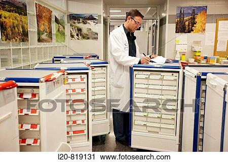 Stock Image - Pharmacy medication carts. Hospital Universitario de Gran Canaria Doctor Negrin, Las Palmas de Gran Canaria. Canary Islands, Spain. Fotosearch
