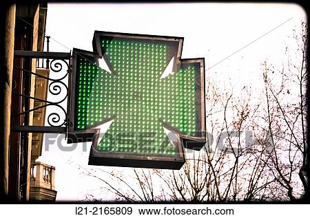 Stock Photo - Pharmacy sign. Barcelona, Catalonia, Spain.. Fotosearch