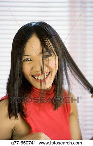 Stock Image - Philippines. Boracay. Philippino woman lifestyle.. Fotosearch