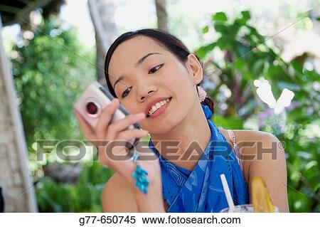 Stock Photography - Philippines. Boracay. Philippino woman lifestyle.. Fotosearch