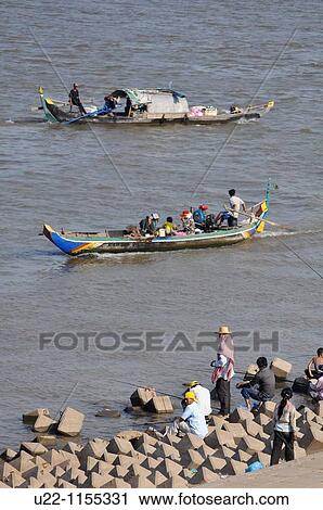 Phnom Penh (Cambodia): men fishing and canoes by the Sisowath Quay, at the confluence of the Tonl? Sap, Mekong, and Bassac rivers View Large Photo Image Stock Image - Phnom Penh (Cambodia): men fishing and canoes by the Sisowath Quay, at the confluence of the Tonl? Sap, Mekong, and Bassac rivers. Fotosearch