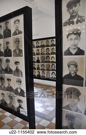 Stock Image - Phnom Penh (Cambodia): photos of the victims at the Tuol Sleng Genocide Museum, former school and Security Prison 21 (S-21) of the Khmer Rouge regime. Fotosearch