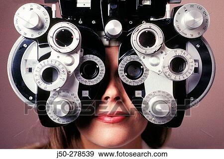 Stock Photo - Phoropter, used for Eye Examination to determine amount of desired correction. Fotosearch