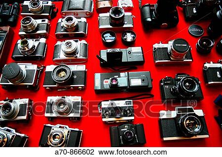 Photo flea market old person similar cameras View Large Photo Image Stock Image - Photo flea market old person similar cameras. Fotosearch