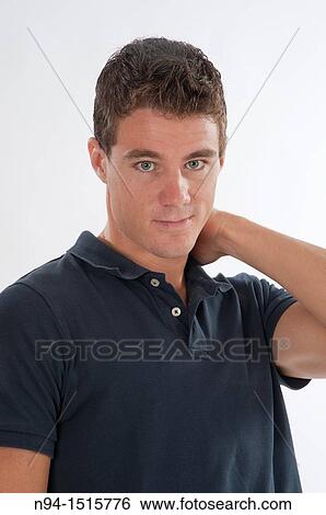 Photo of closeup of a teenage boy with his hand on the neck. View Large Photo Image Stock Photograph - Photo of closeup of a teenage boy with his hand on the neck.. Fotosearch