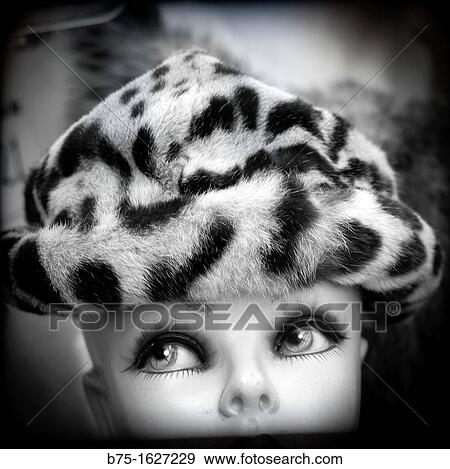 photograph of a female mannequin face of a hat with animal print View Large Photo Image Stock Photo - photograph of a female mannequin face of a hat with animal print. Fotosearch