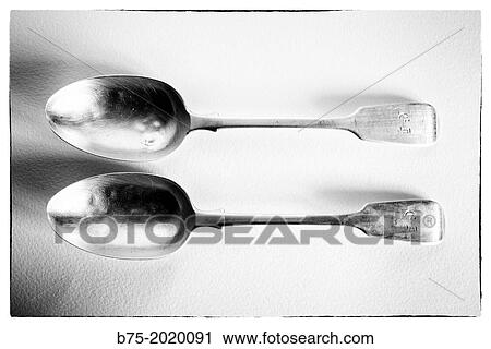 photograph of two old silver spoons View Large Photo Image Stock Image - photograph of two old silver spoons. Fotosearch