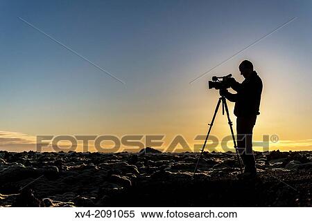 Photographer silhouette in the coast of Reykjanesta, Iceland. View Large Photo Image Stock Photography - Photographer silhouette in the coast of Reykjanesta, Iceland.. Fotosearch