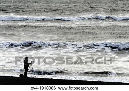 Photographer take shot at Vik black beach South of Iceland View Large Photo Image Stock Photograph - Photographer take shot at Vik black beach South of Iceland. Fotosearch