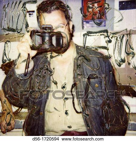 Picture - Photographer with a panoramic camera.. Fotosearch
