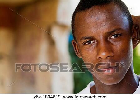 Photographs of portrait of a black man, Cullera, Valencia, Valencia, Spain, Europe View Large Photo Image Stock Photo - Photographs of portrait of a black man, Cullera, Valencia, Valencia, Spain, Europe. Fotosearch