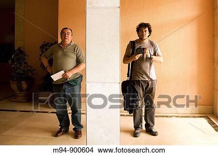 Photography making self-portrait with his father View Large Photo Image Picture - Photography making self-portrait with his father. Fotosearch