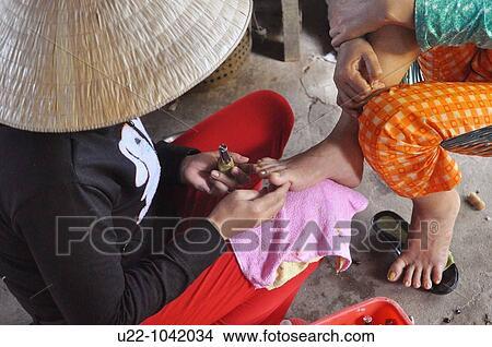 Phu Quoc (Vietnam): pedicure at Ganh Dau village View Large Photo Image Picture - Phu Quoc (Vietnam): pedicure at Ganh Dau village. Fotosearch