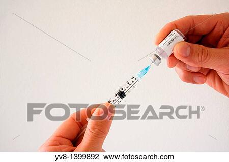 Physician preparing vaccination View Large Photo Image Stock Image - Physician preparing vaccination. Fotosearch