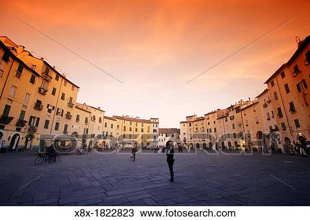 Piazza dell? Amfiteatro at dusk, Lucca, Italy View Large Photo Image Stock Image - Piazza dell? Amfiteatro at dusk, Lucca, Italy. Fotosearch