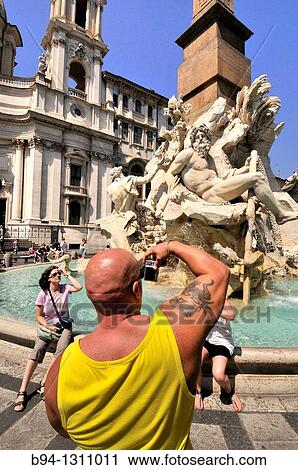 Piazza Navona. Fountain of the four Rivers, 1651 by Gian Lorenzo Bernini with Egyptian obelisk. Rome. Italy. View Large Photo Image Stock Image - Piazza Navona. Fountain of the four Rivers, 1651 by Gian Lorenzo Bernini with Egyptian obelisk. Rome. Italy.. Fotosearch