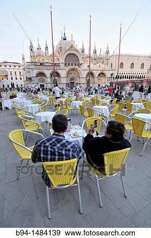 Piazza San Marco and Saint Mark's Basilica. Cathedral church of the Roman Catholic Archdiocese of Venice. Byzantine architecture. Venice, Veneto, Italy. View Large Photo Image Stock Photo - Piazza San Marco and Saint Mark's Basilica. Cathedral church of the Roman Catholic Archdiocese of Venice. Byzantine architecture. Venice, Veneto, Italy.. Fotosearch